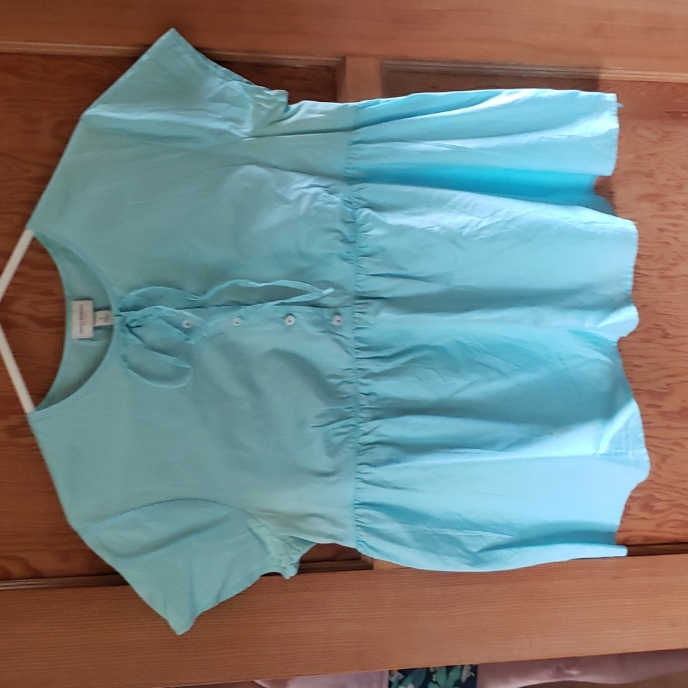 Lightweight cotton turquoise pullover blouse.